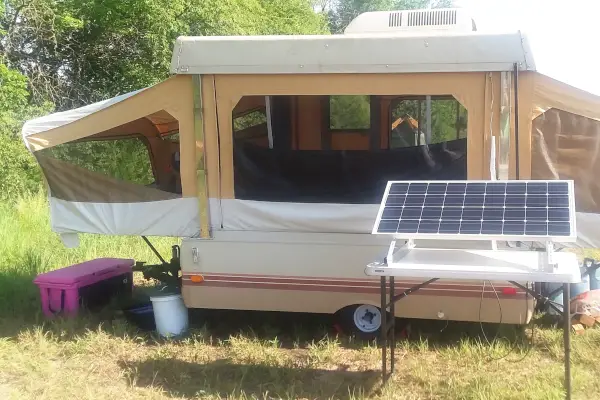 homesteading off the grid popup camper with solar panel