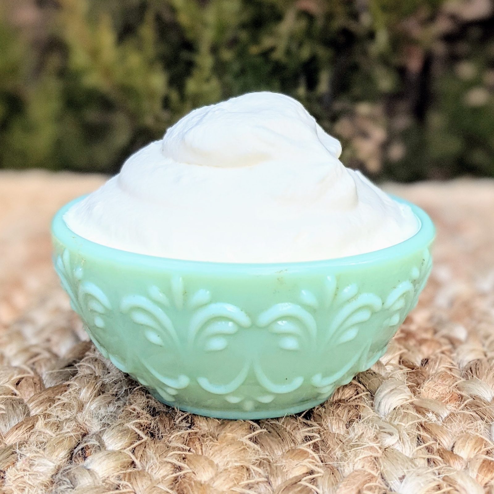 whipped cream in green bowl