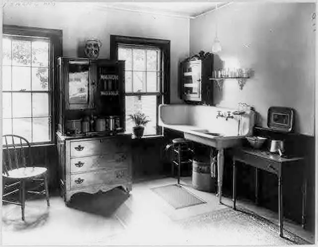 black and white photo of victorian kitchen