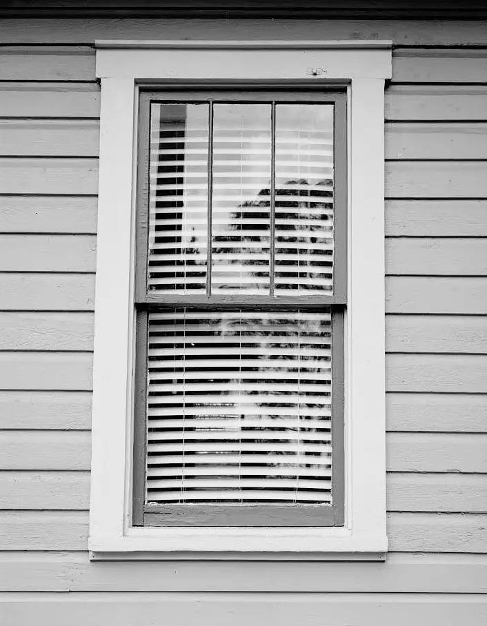 black and white photo of window
