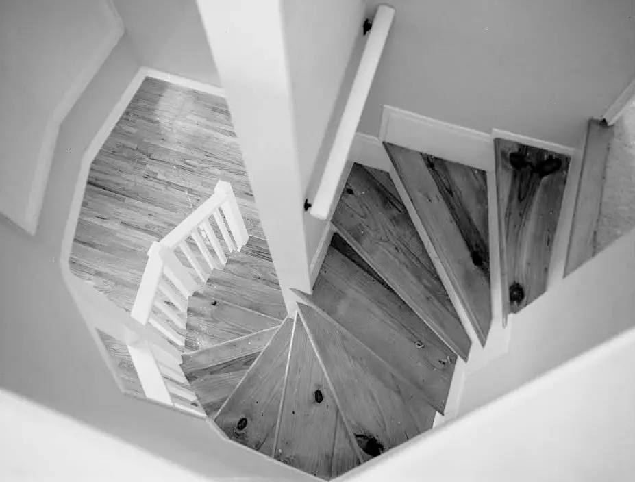 black and white photo of spiral staircase