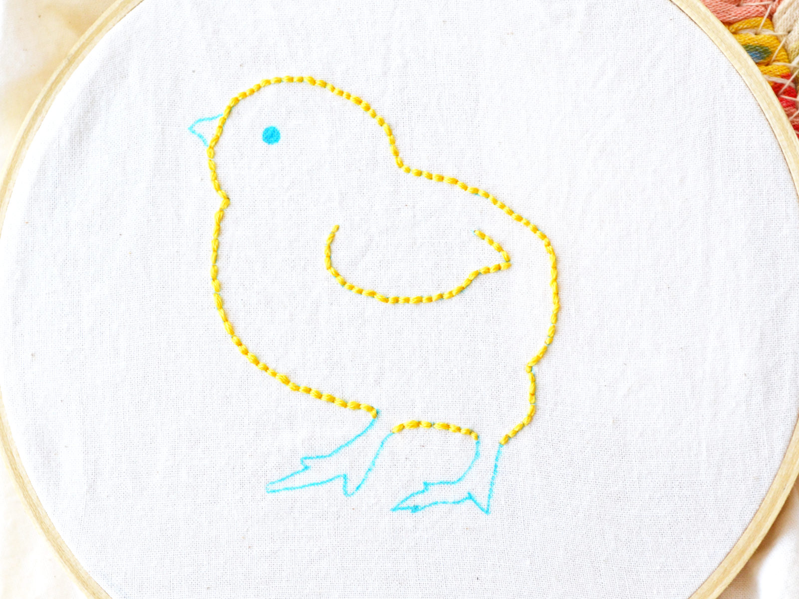 embroidery tutorial for beginners chick outlined with wing completed