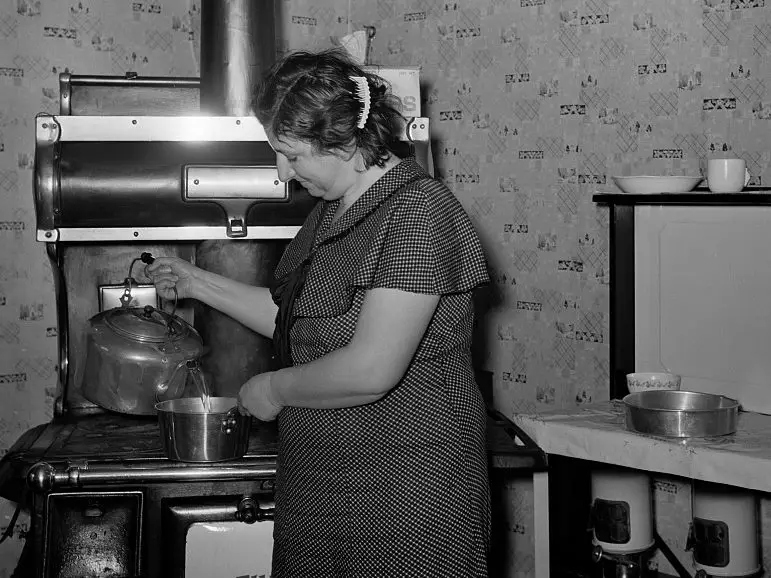 1930s woman working at stove
