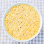 top view of creamed corn in white bowl