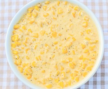 top view of creamed corn in white bowl