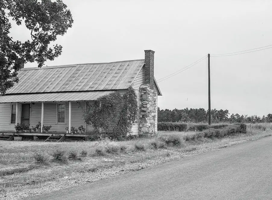 farmhouse with electricity pole outside