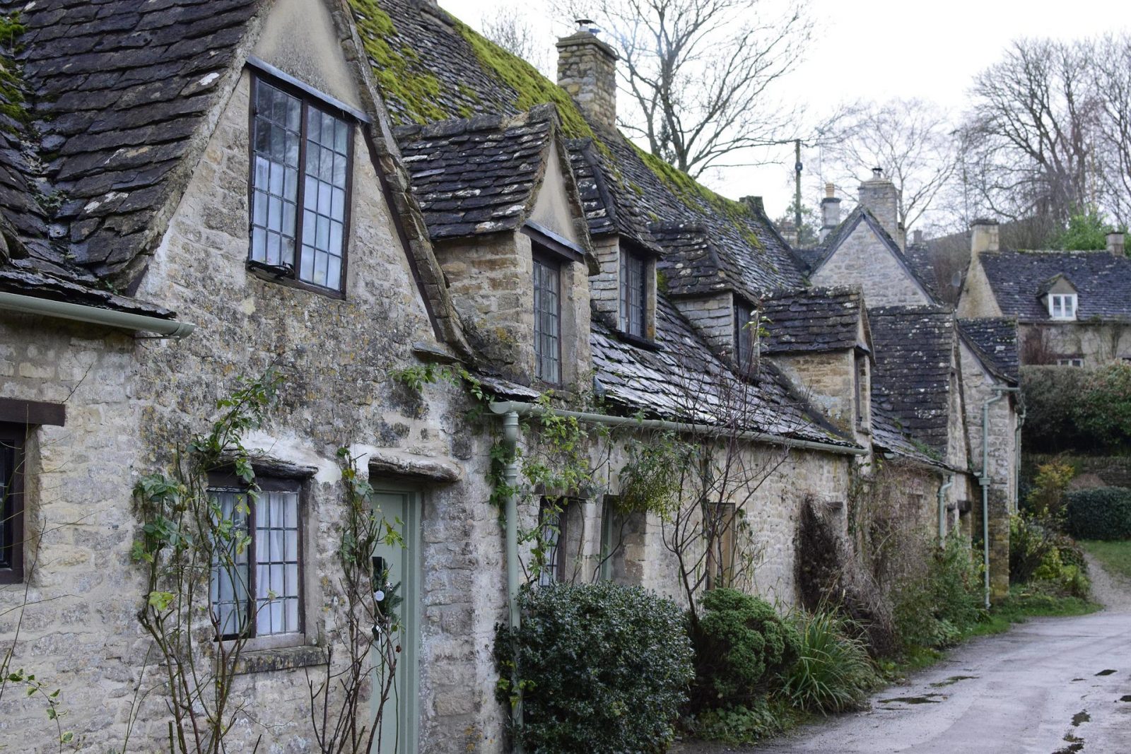 english village street with line of stone houses