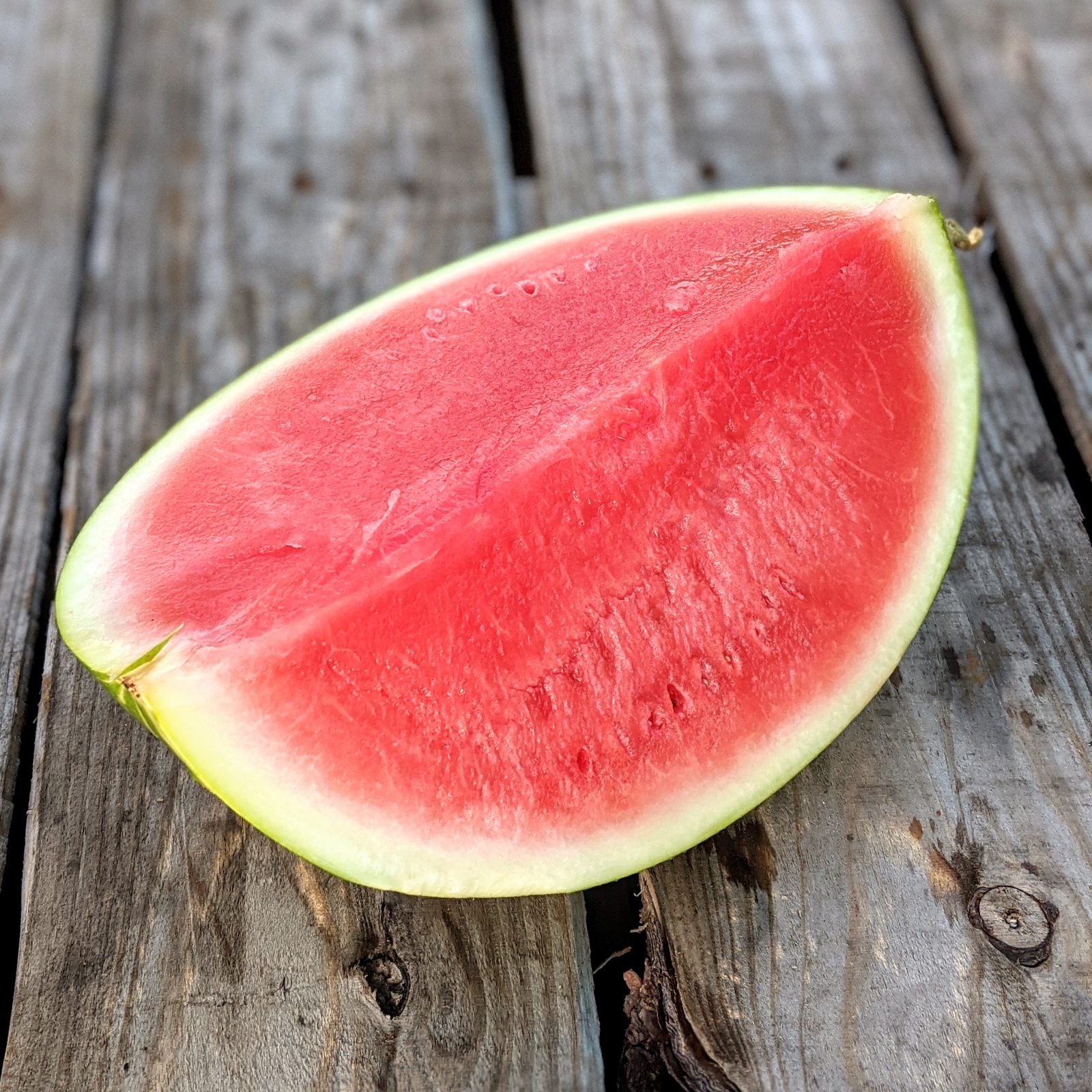 large slice of red ripe watermelon